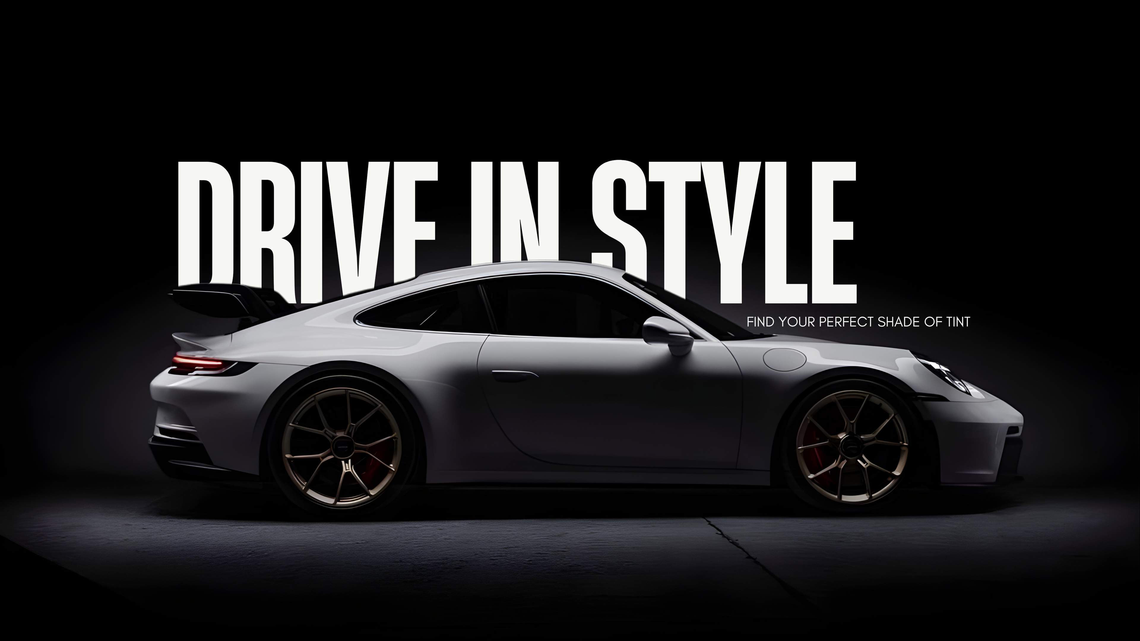 Silhouette of a sports car with 'Drive in Style' text on a black background